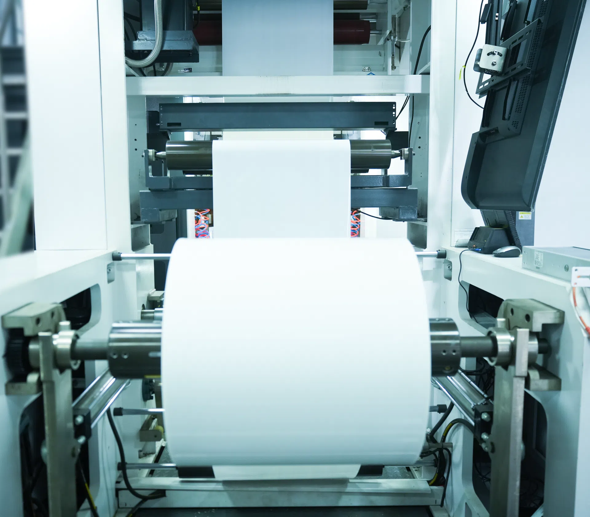 Flexo press non-stop unwinding and web handling unit